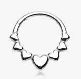 Queen of Hearts Steel Seamless Clicker Hoop Ring with three smaller hearts on each side surrounding one center larger heart.