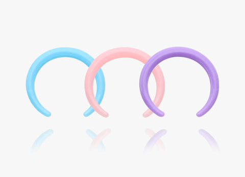 Three Bio-Flex material Septum Piercing Retainers in Baby blue, pink, and purple from bm25.com