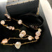 Leoni & Vonk long pearl and gold necklace on a black boxe