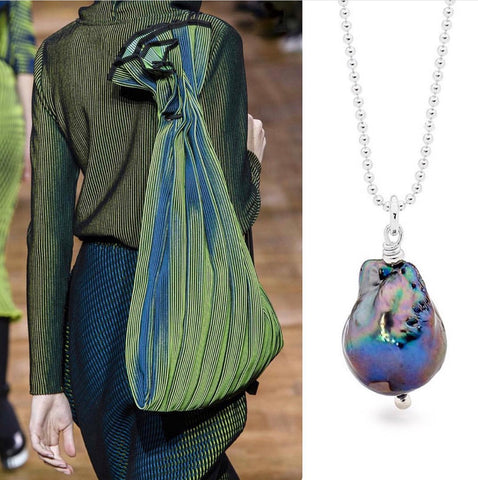 Leoni & Vonk peacock baroque pearl with green Issey Miyake outfit