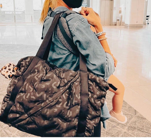 LJ using her weekender 2 as a baby bag