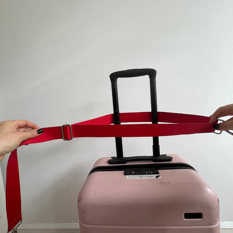 Travel hack: How to attached your go 2 tote to a rolling suitcase
