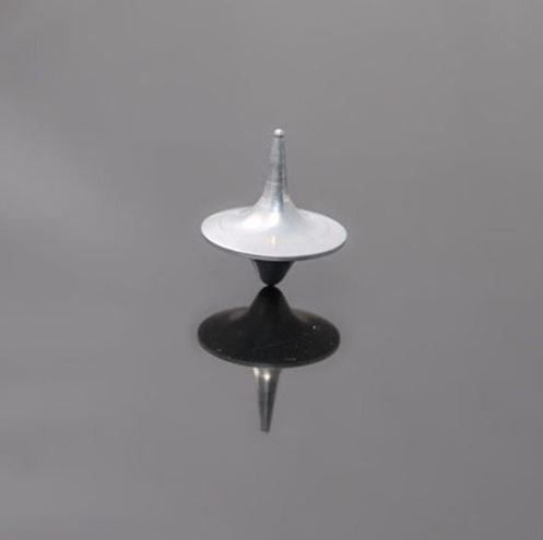 silver spinning top