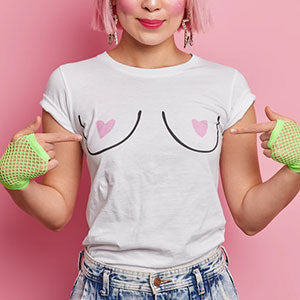 woman pointing at breasts on t-shirt