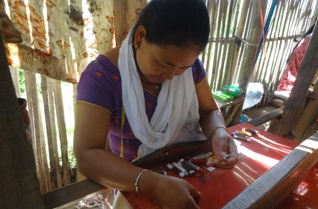 woman making dhaka print fabric 