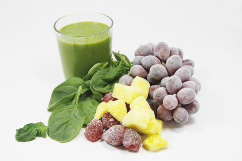 Fruit, vegetables, and drink with white background