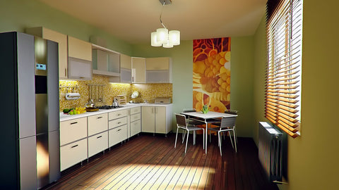 Kitchen with green walls and decorations