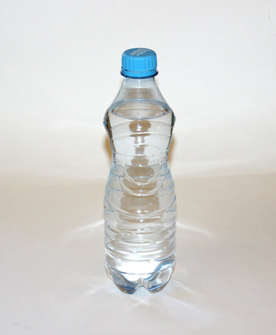Full bottle of water with a blue cap.