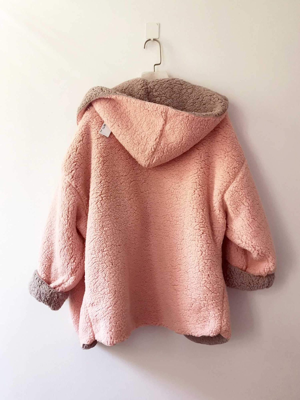 reversible fuzzy faux fur hooded coat