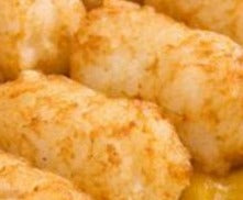 Steaming rows of freshly baked tater tots