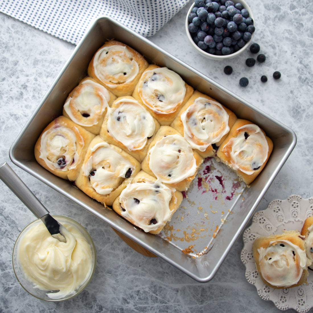 Rada Cutlery Cake Pan with blueberry cinnamon rolls and frosting.