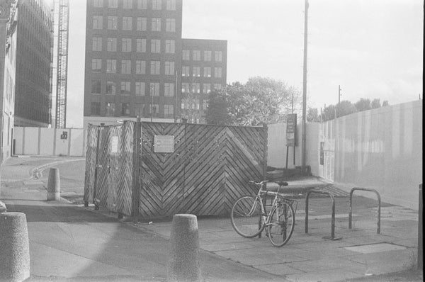 A bicycle next to Aire park in Leeds