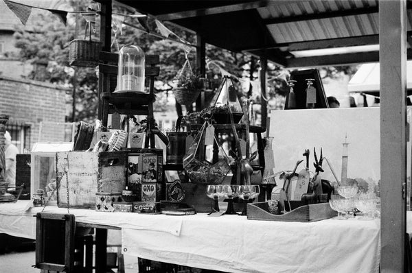 A market stall in black and white.