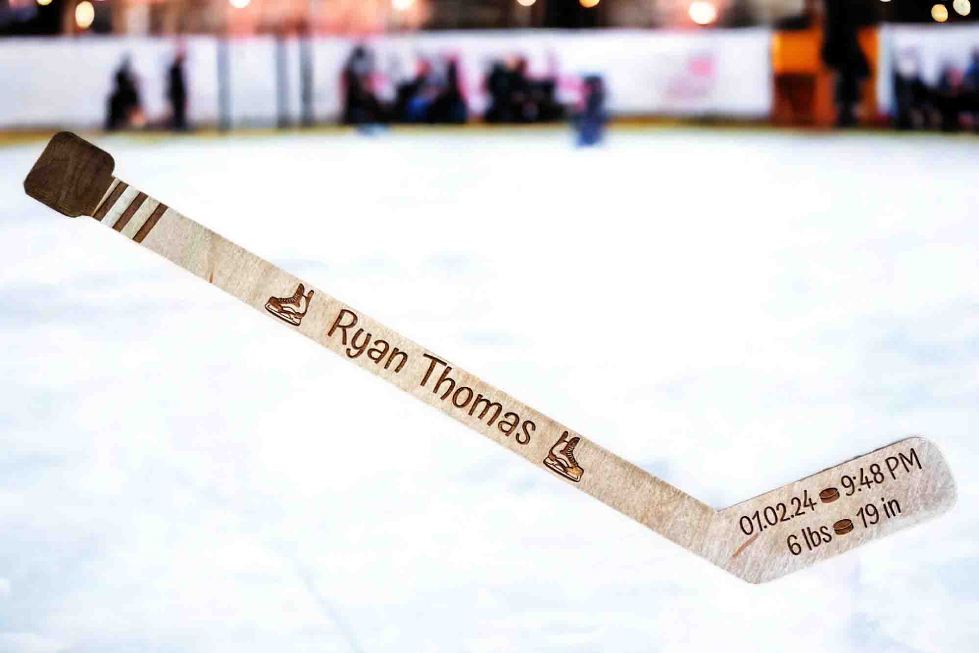 Hockey stick birth announcement.jpg__PID:c230373a-2220-45bf-9b9e-bf4f2aeae487