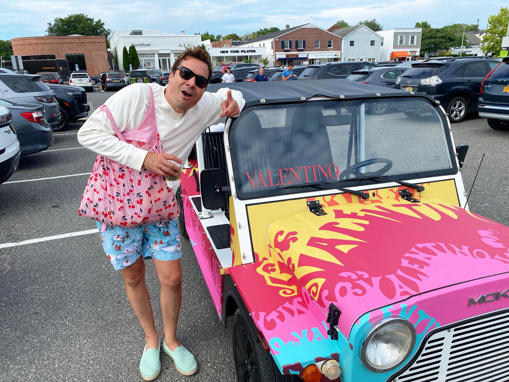 Jimmy Fallon in front of a custom wrapped electric Moke from Moke America and WeMoke in East Hampton, in collaboration with Valentino