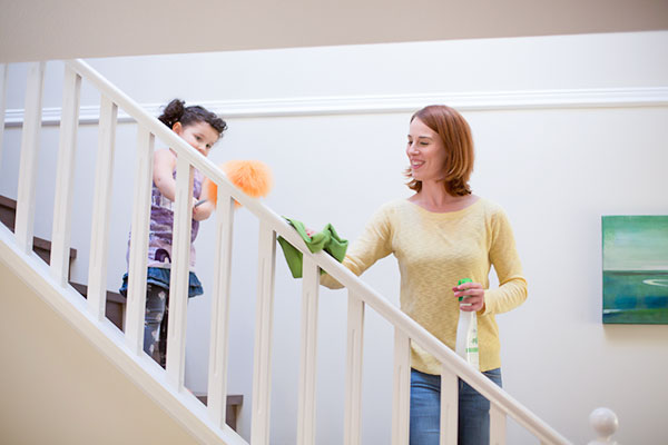 Mom and the kit are cleaning the house, using AspenClean products