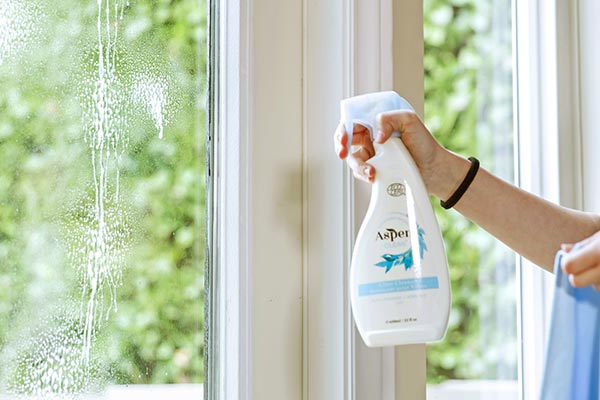 Use AspenClean natural glass cleaner to clean the glass