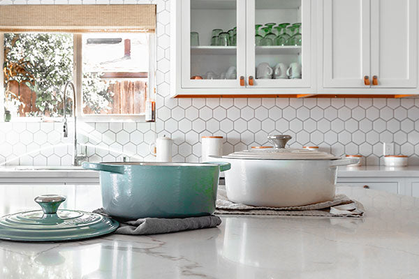 two cooking pots on the table 