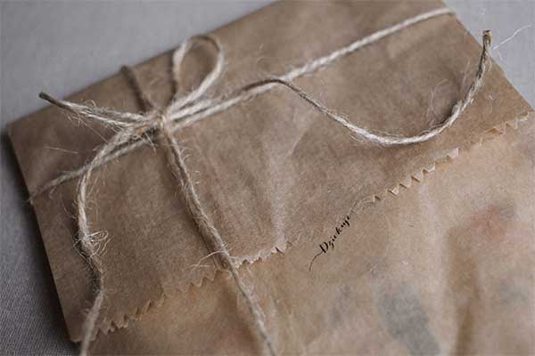 Gift with sustainable wrapping material