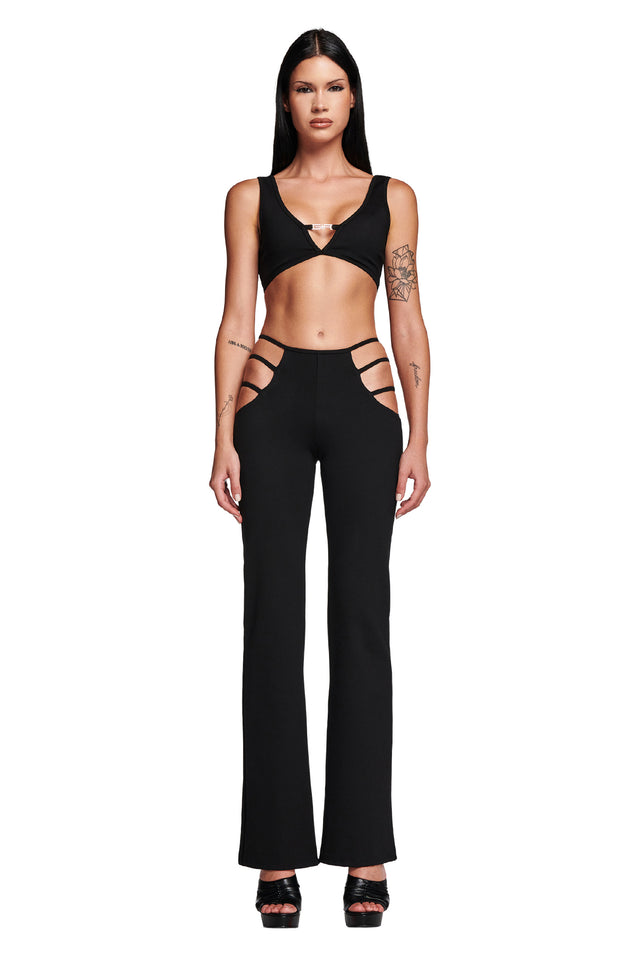 Flared trousers with cut out detail | Pinkwoman