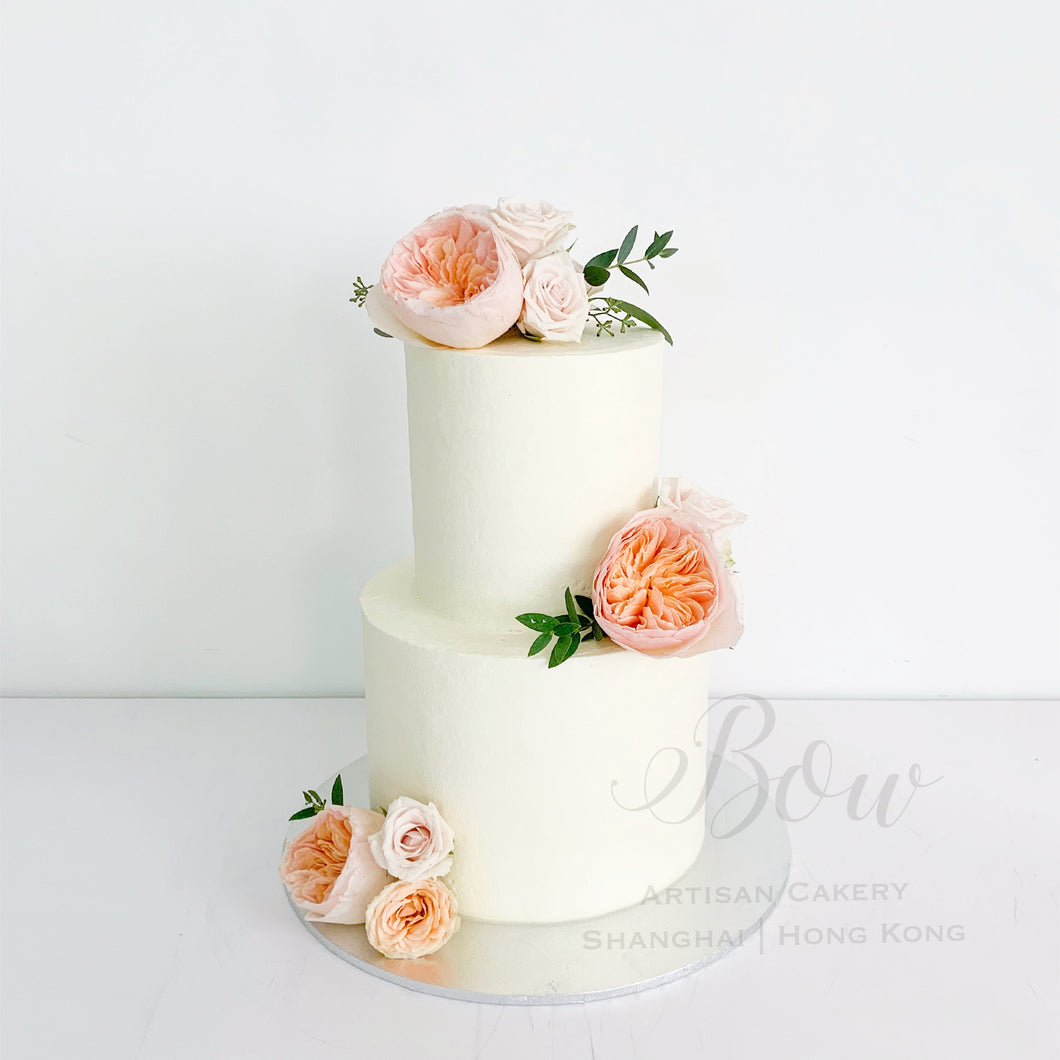 2 Tier White Wedding Cake With Maroon And Cream Floral Accents