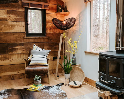 Black Rattan Floor Lamp in log cabin