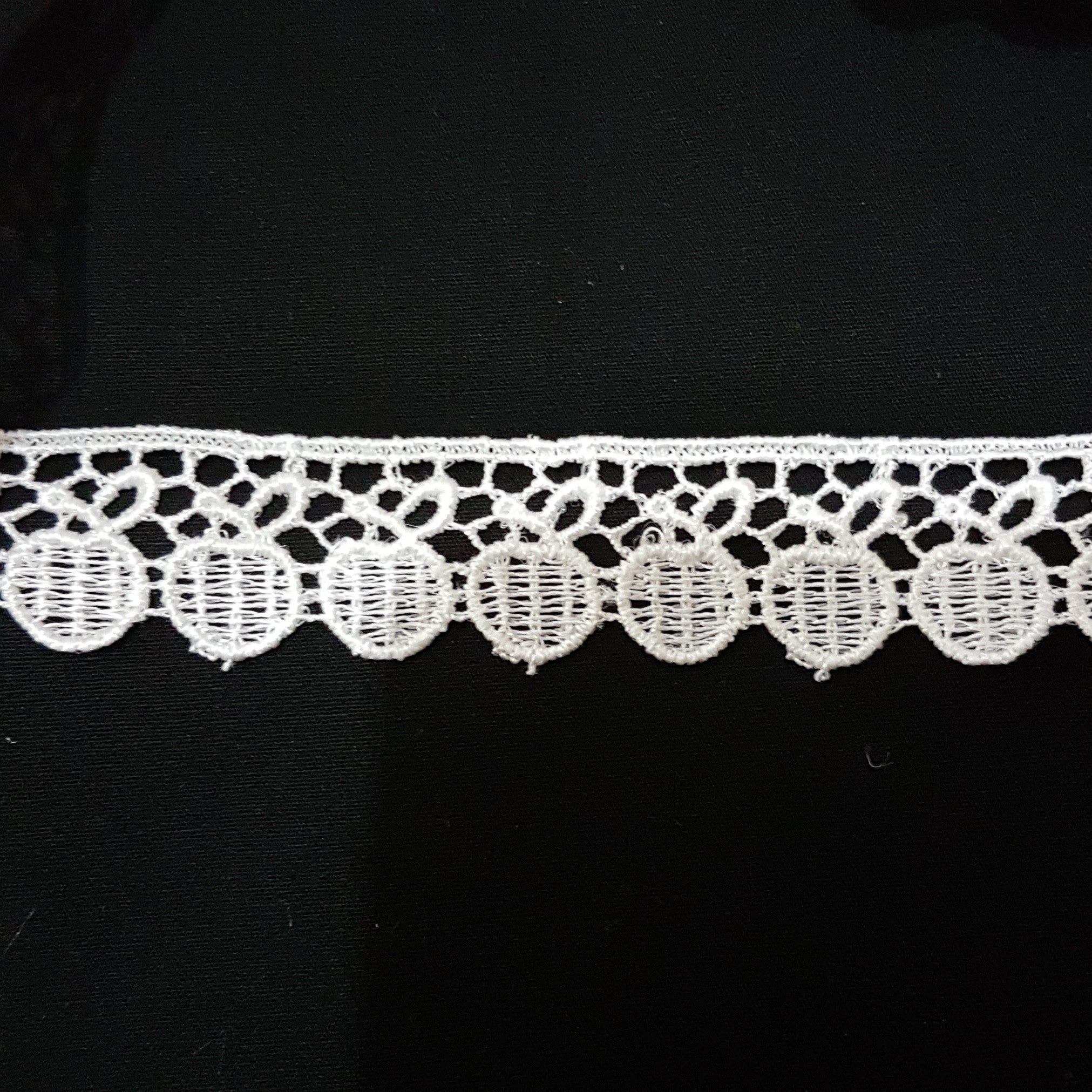 white lace fabric by the metre