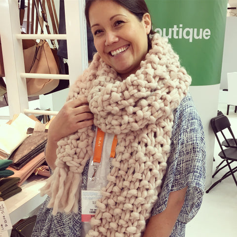 Lindsay Liebherr wearing a blush knitted scarf