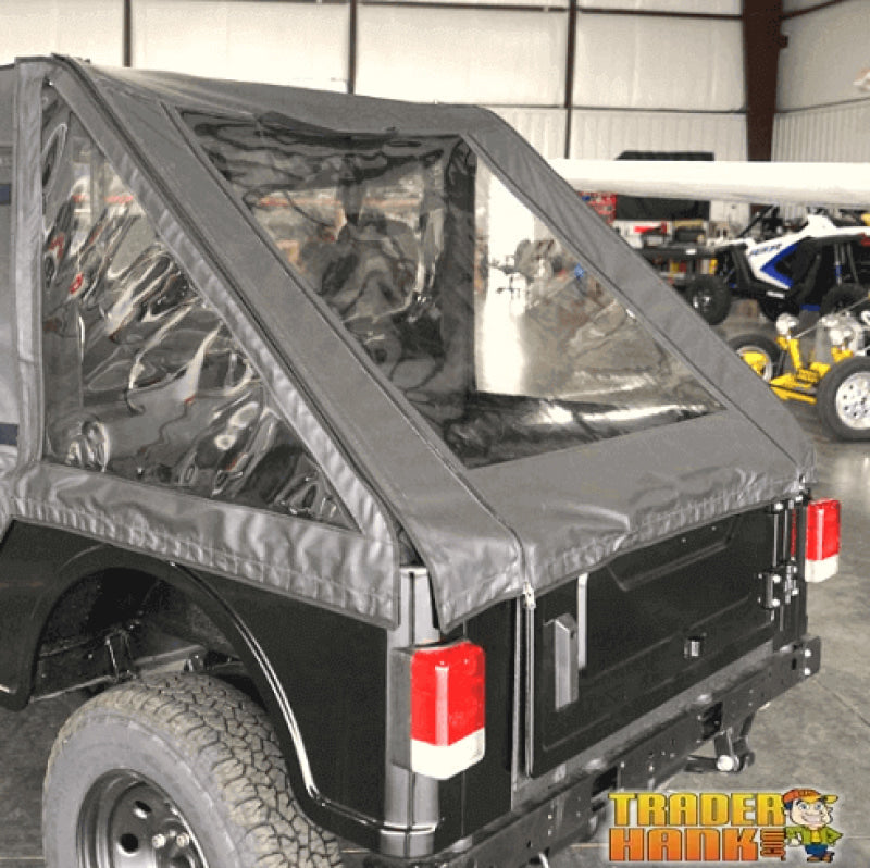 https://cdn.shopify.com/s/files/1/1848/0573/products/mahindra-roxor-soft-rear-cargo-cover-traderhank-182.jpg?v=1668643935