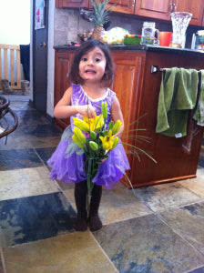 Fern greeting me with flowers on Valentine's day...