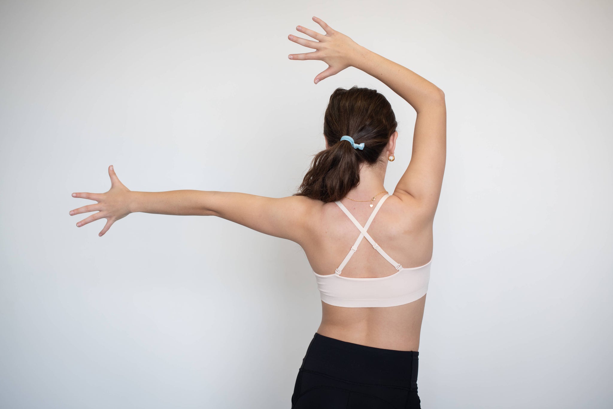 Girl dancing in a sports bra for teens.