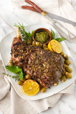 Pesto Roasted Lamb with Garlic Stuffed Olives