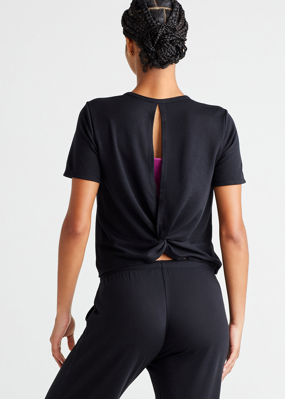 peek-a-boo twist back lounge top - baby french terry in Black worn by a woman facing backward Yummie