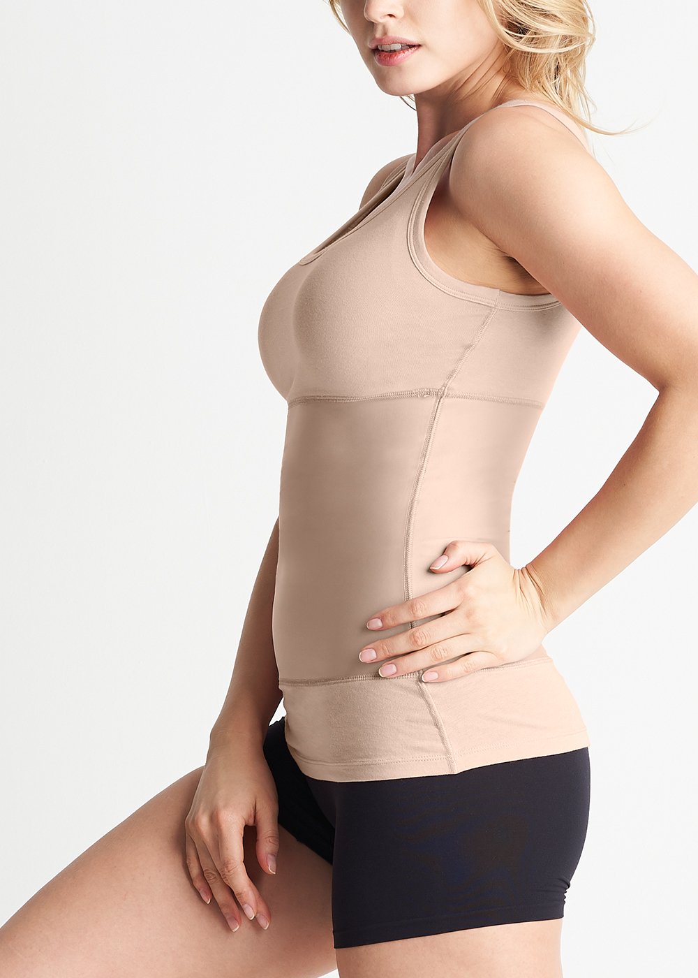 Boyfriend Yummie Tummie® 3-Panel Shaping Tank in almond worn by a woman standing facing left with her right hand on her inner thigh and left hand on hip yummie