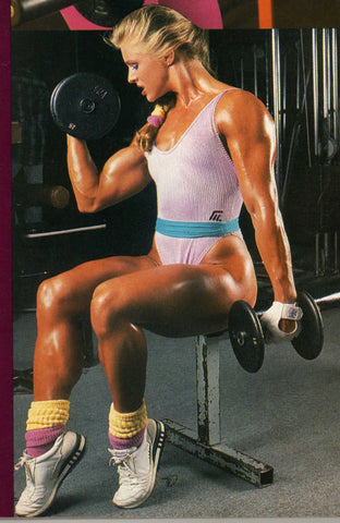 Woman doing seated bicep curls wearing a 80s bodybuilding clothes leotard - Allrj