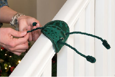 Attach the Banister Saving Garland Tie to the banister