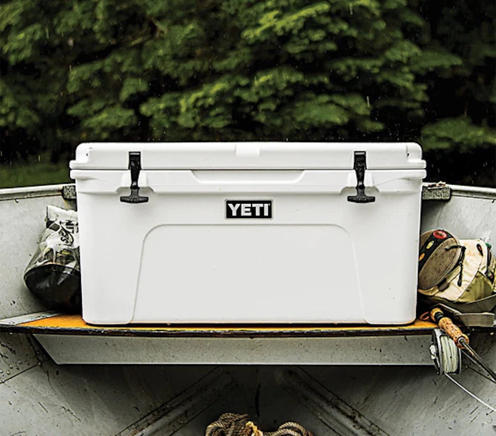 a closed white YETI Tundra® 65 Cool Box on a fishing boat