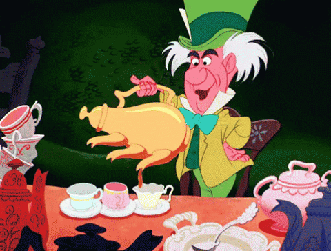 Mad Hatter pouring tea -- Alice in Wonderland Mad Hatter