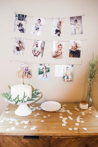 simple boho first birthday girl smash cake white greenery