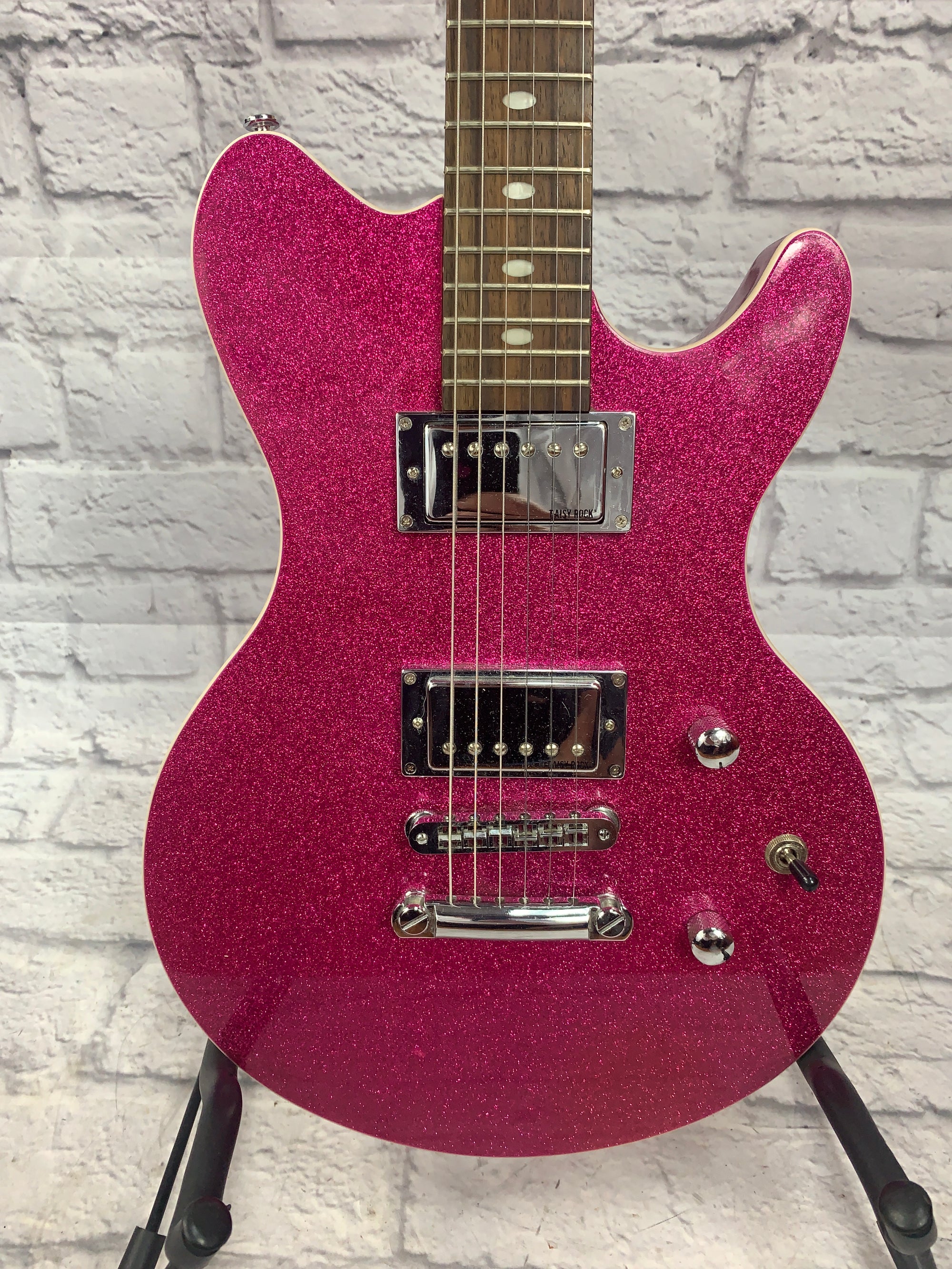 pink sparkle electric guitar