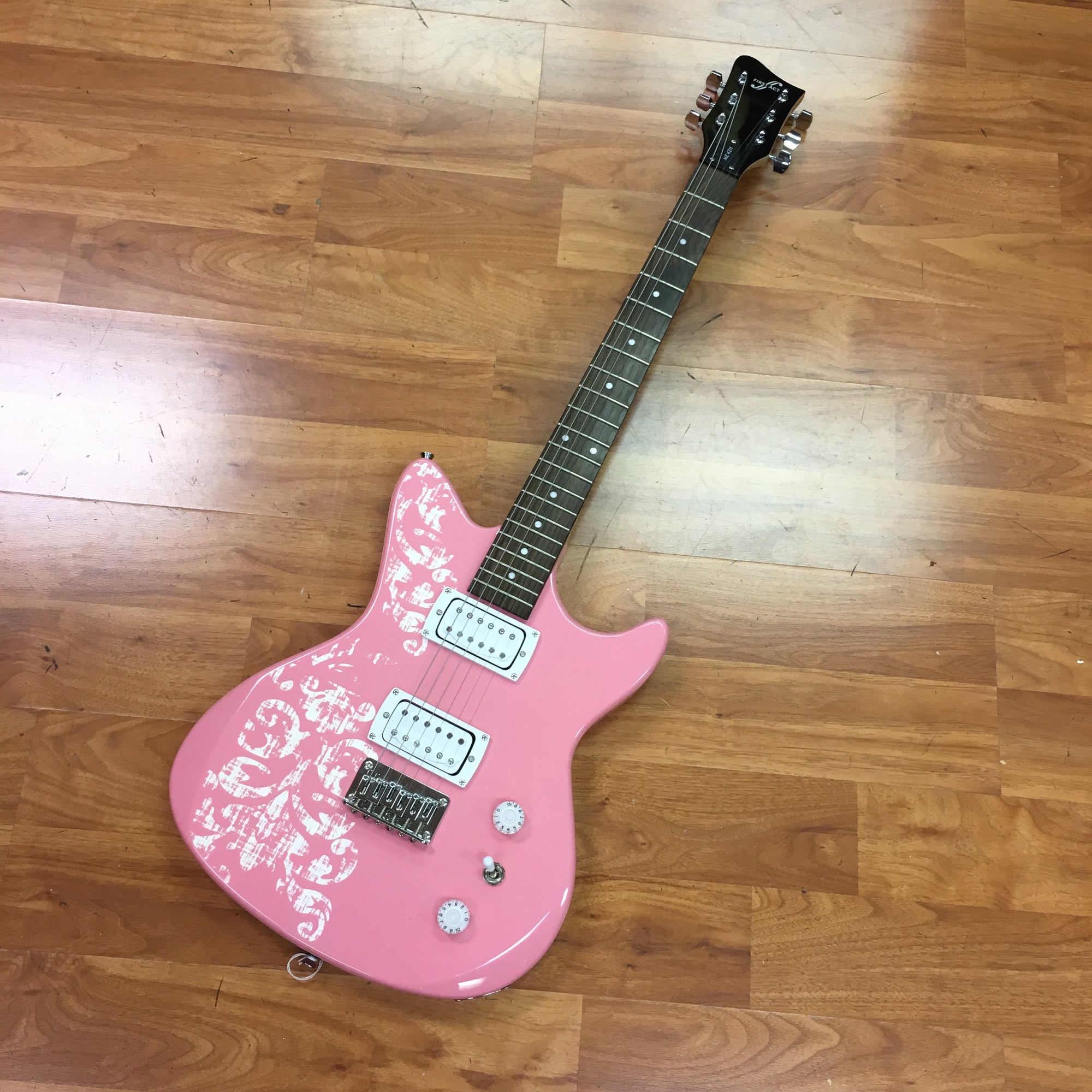 first act pink electric guitar