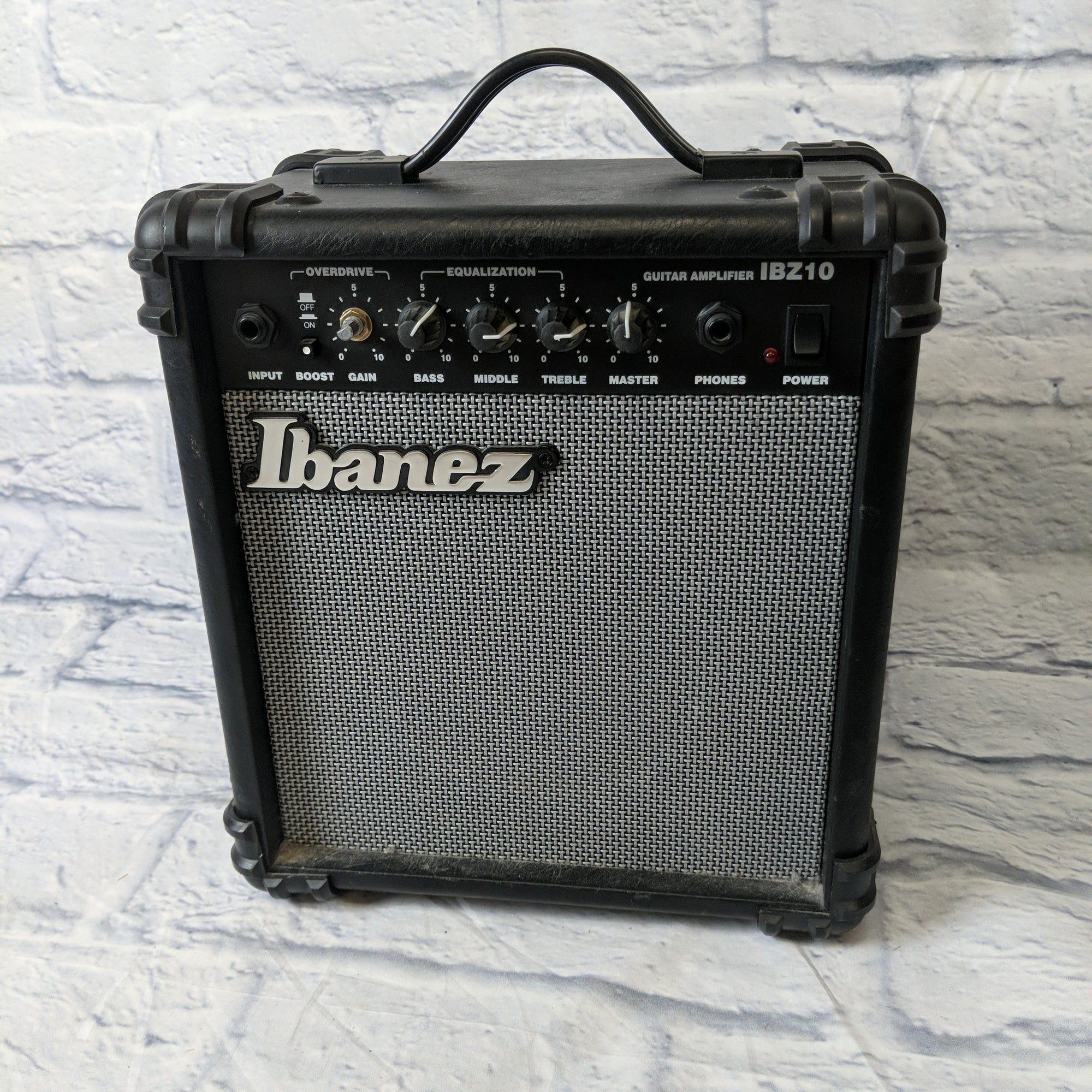 ibanez electric guitar and amp