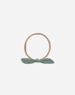 Rylee + Cru aqua shade 1 little knot headband against white backdrop