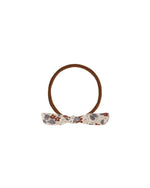 Rylee + Cru floral Shade 2 little knot head against white backdrop