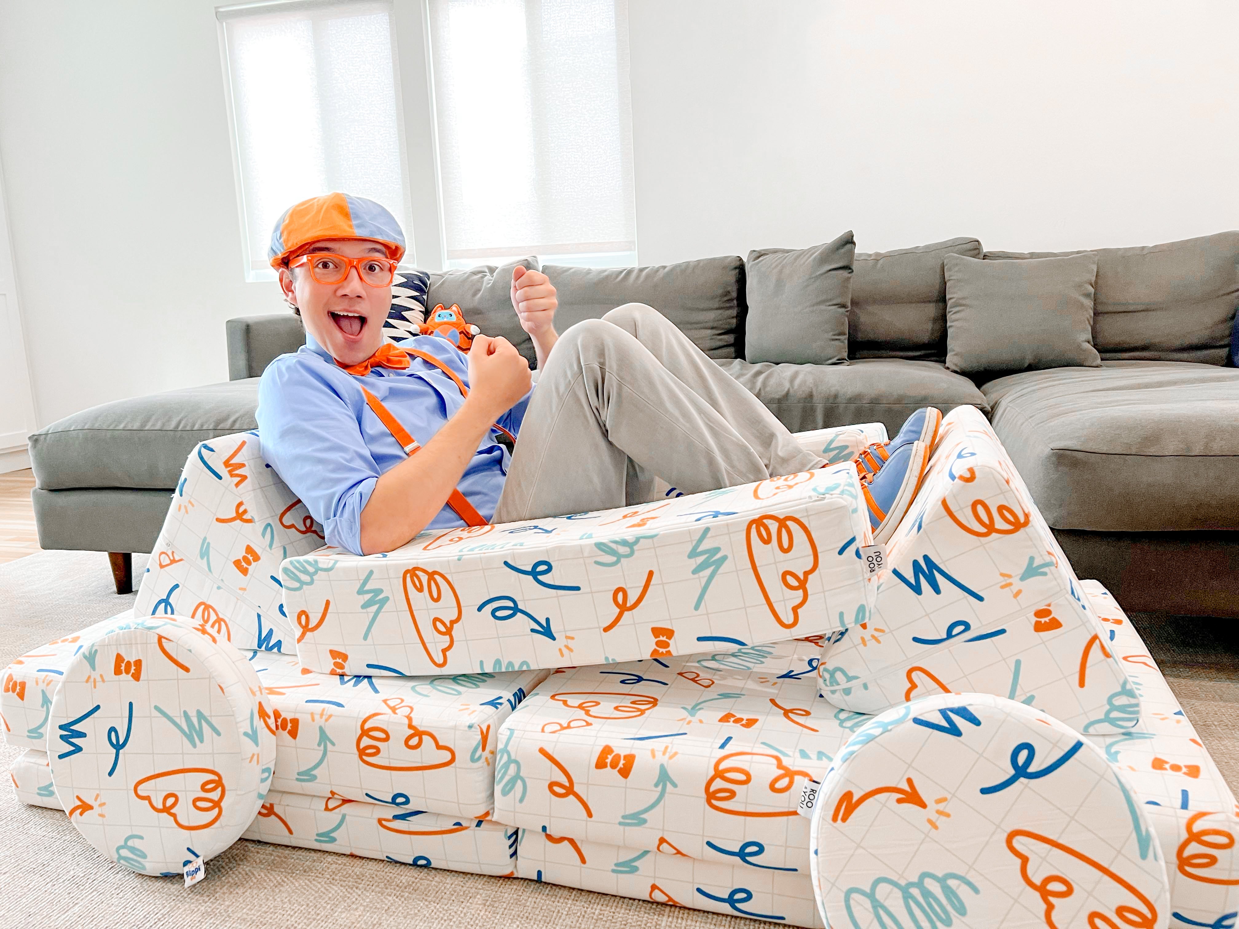 Blippi driving his car made from his play couch