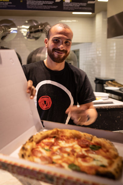 A Pizzaiolo at Mercato Centrale in Firenze