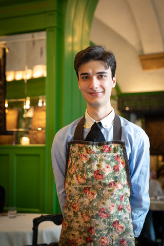 A server at Gucci Osteria - Florence, Italy