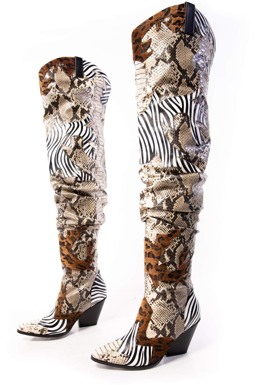 cow print thigh high boots