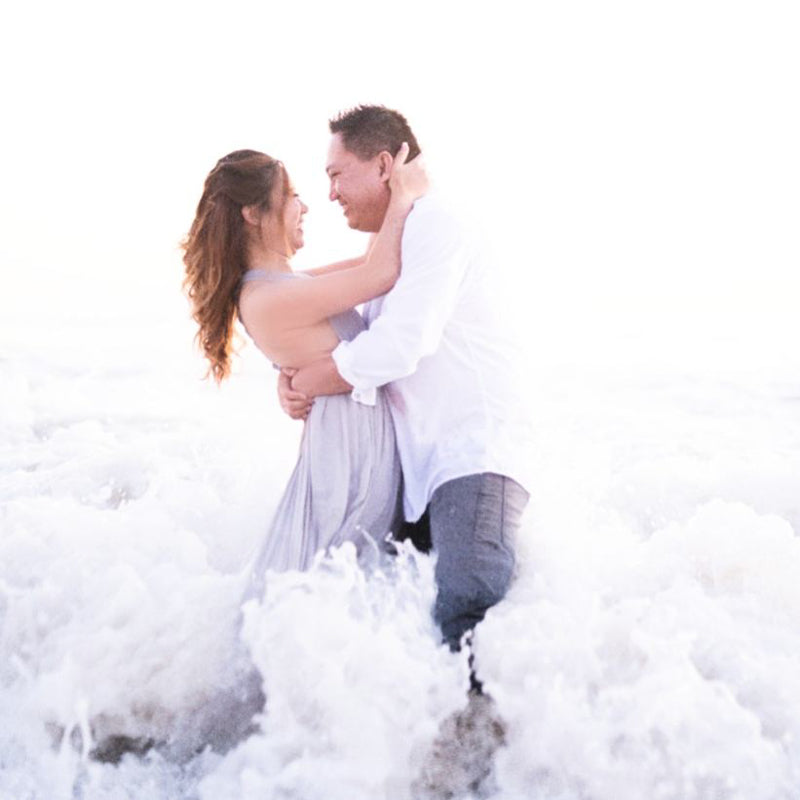 Couple Waves Beach Photo