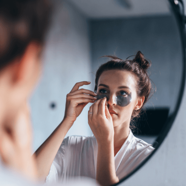 woman using under eye masks